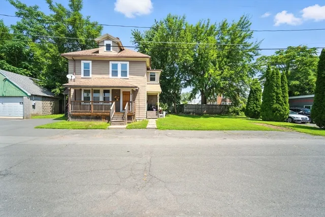 a view of a house with a swimming pool