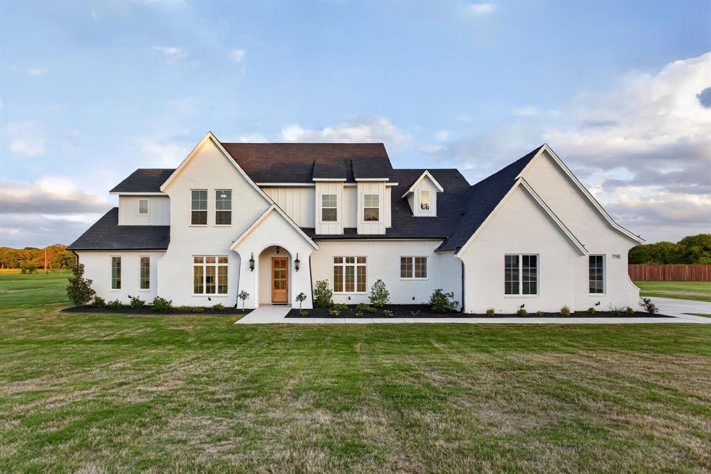 7798 Barber Rnch Road Fort Worth, TX 76126 - Photo 2 of 40 a front view of a house with a yard