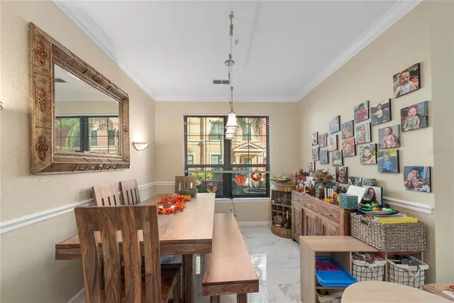 a kitchen with refrigerator and window