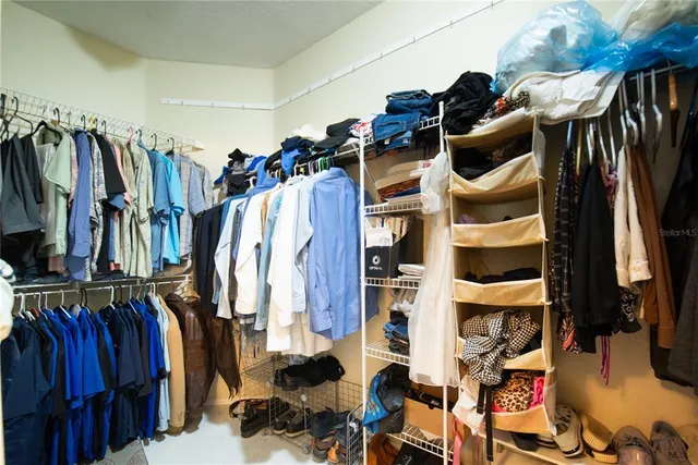 a kitchen with a stove a sink and cabinets