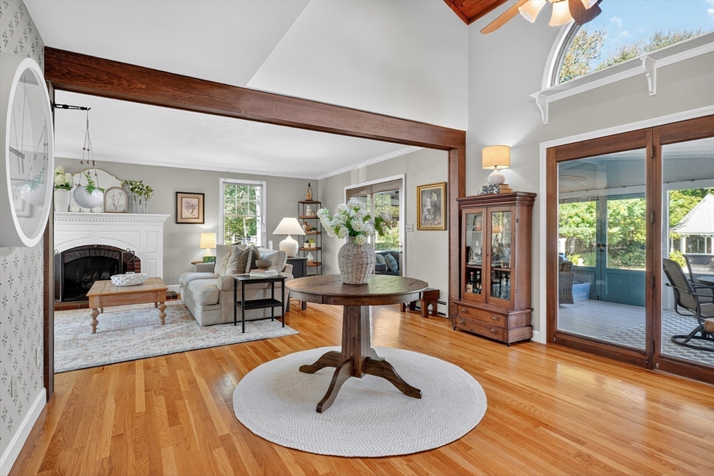 191 Hathaway Road Acushnet, MA 02743 - Photo 14 of 42 a living room with furniture a fireplace and potted plants
