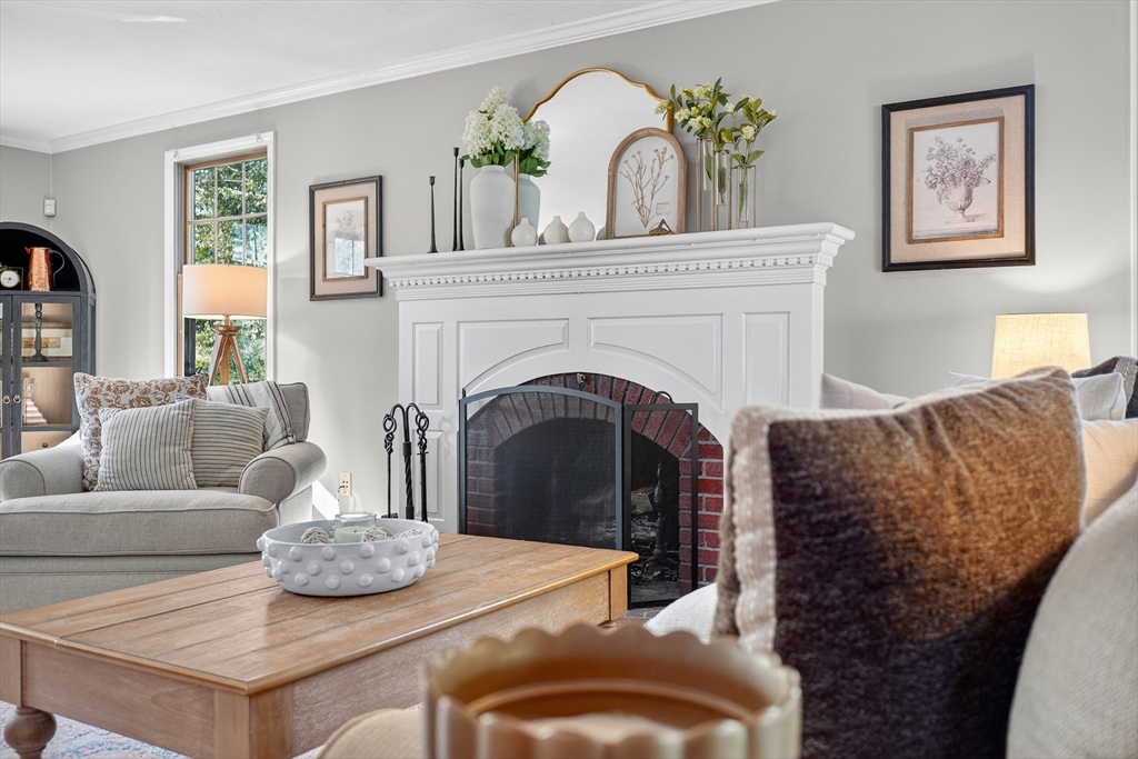 191 Hathaway Road Acushnet, MA 02743 - Photo 15 of 42 a living room with furniture and a fireplace