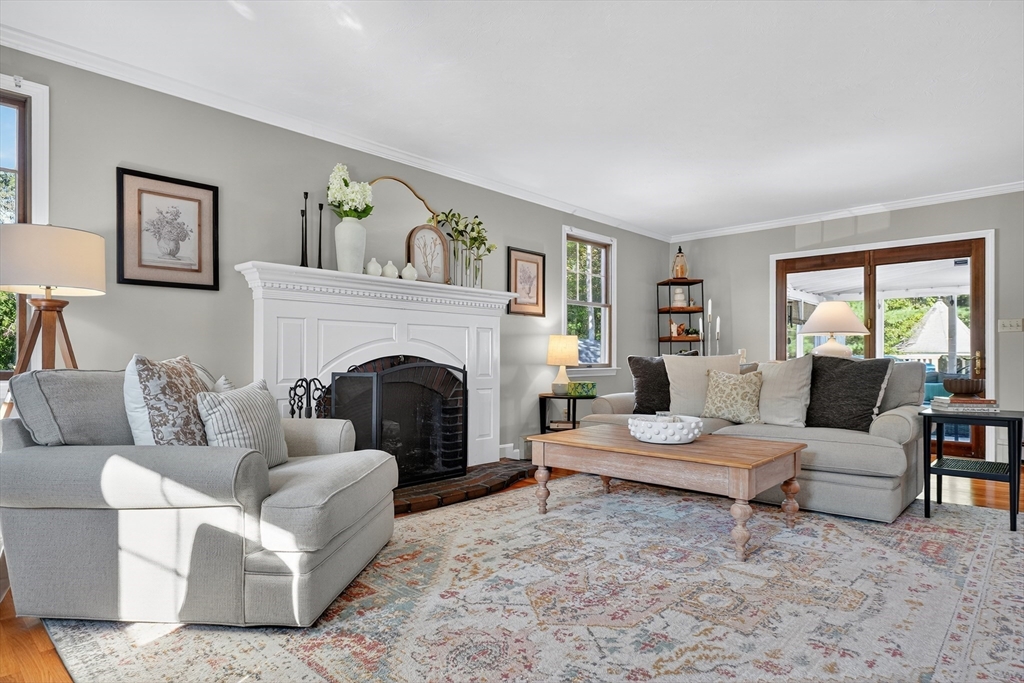 191 Hathaway Road Acushnet, MA 02743 - Photo 17 of 42 a living room with furniture and a fireplace