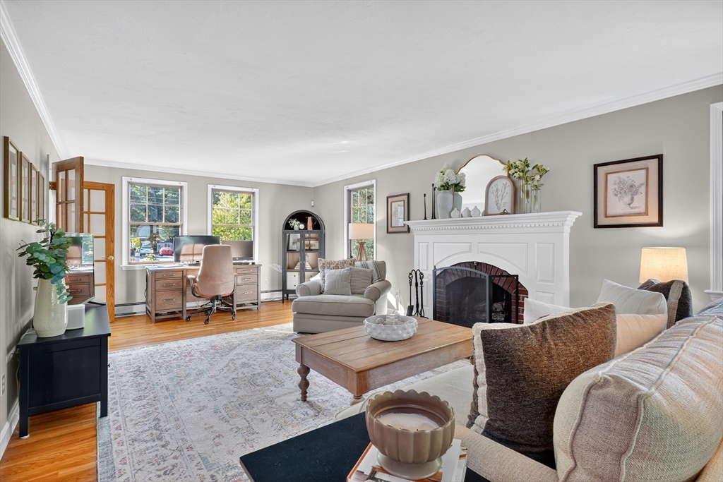 191 Hathaway Road Acushnet, MA 02743 - Photo 18 of 42 a living room with furniture large window and a fireplace