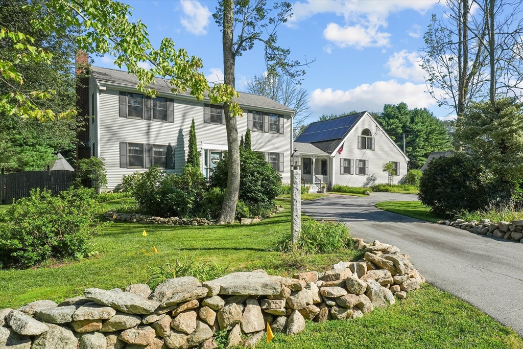 191 Hathaway Road Acushnet, MA 02743 - Photo 2 of 42 a front view of a house with garden