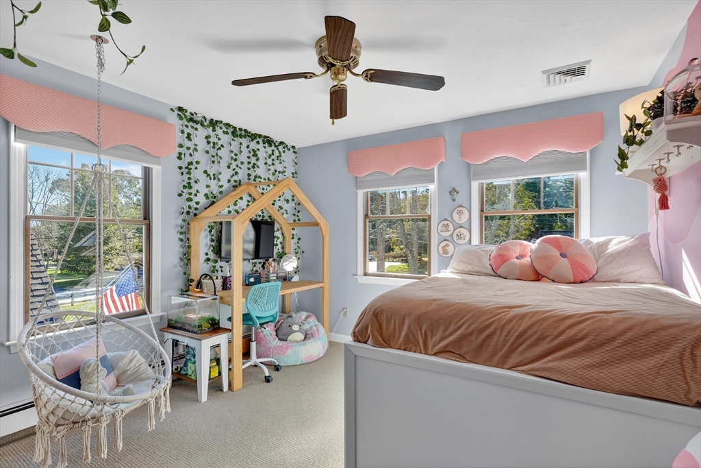 191 Hathaway Road Acushnet, MA 02743 - Photo 21 of 42 a bedroom with a bed and a large window