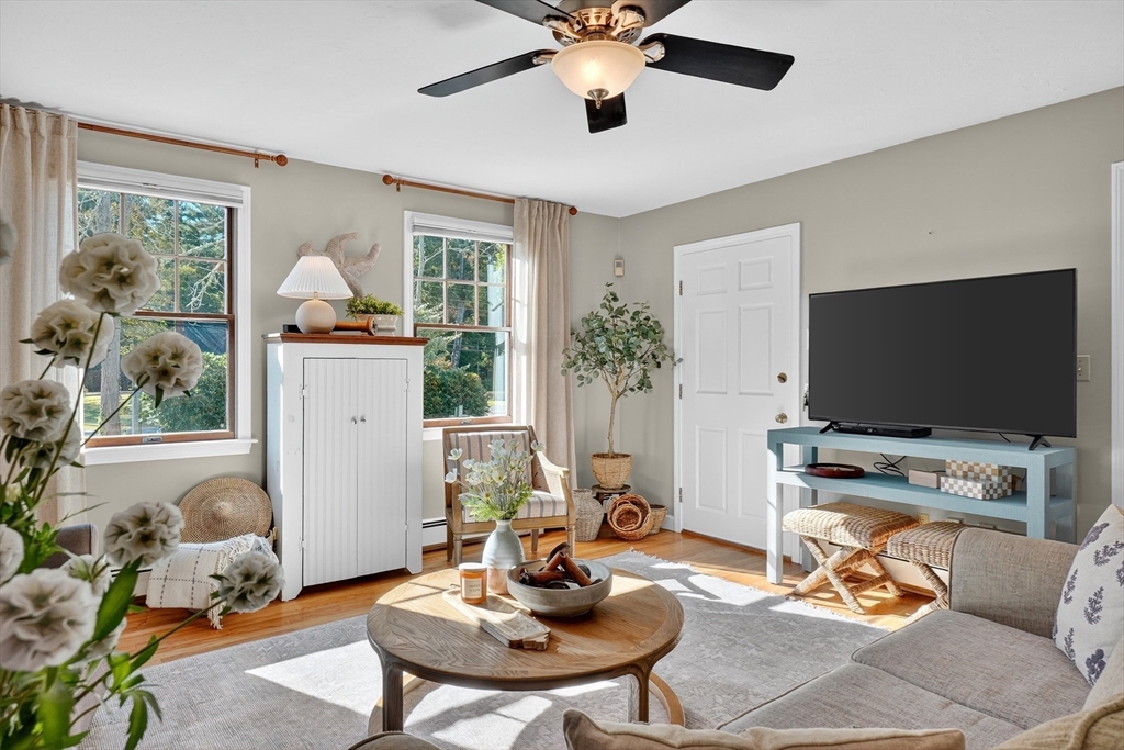 191 Hathaway Road Acushnet, MA 02743 - Photo 25 of 42 a living room with furniture and a flat screen tv