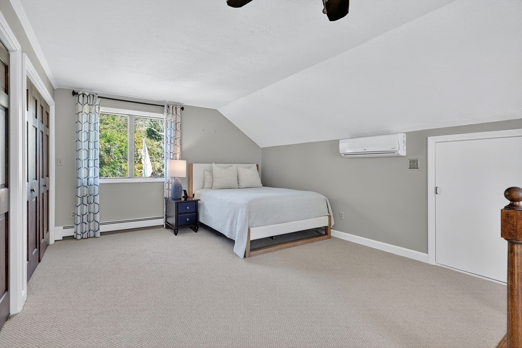 191 Hathaway Road Acushnet, MA 02743 - Photo 30 of 42 a bedroom with a bed and a window