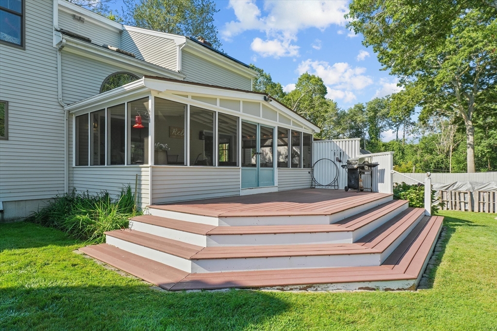 191 Hathaway Road Acushnet, MA 02743 - Photo 32 of 42 a view of a house with a yard porch and sitting area