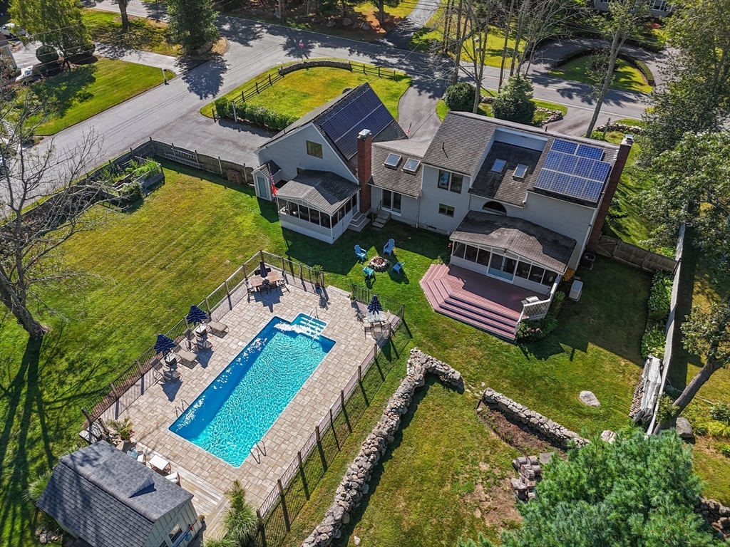 191 Hathaway Road Acushnet, MA 02743 - Photo 41 of 42 an aerial view of a house with a swimming pool yard and outdoor seating