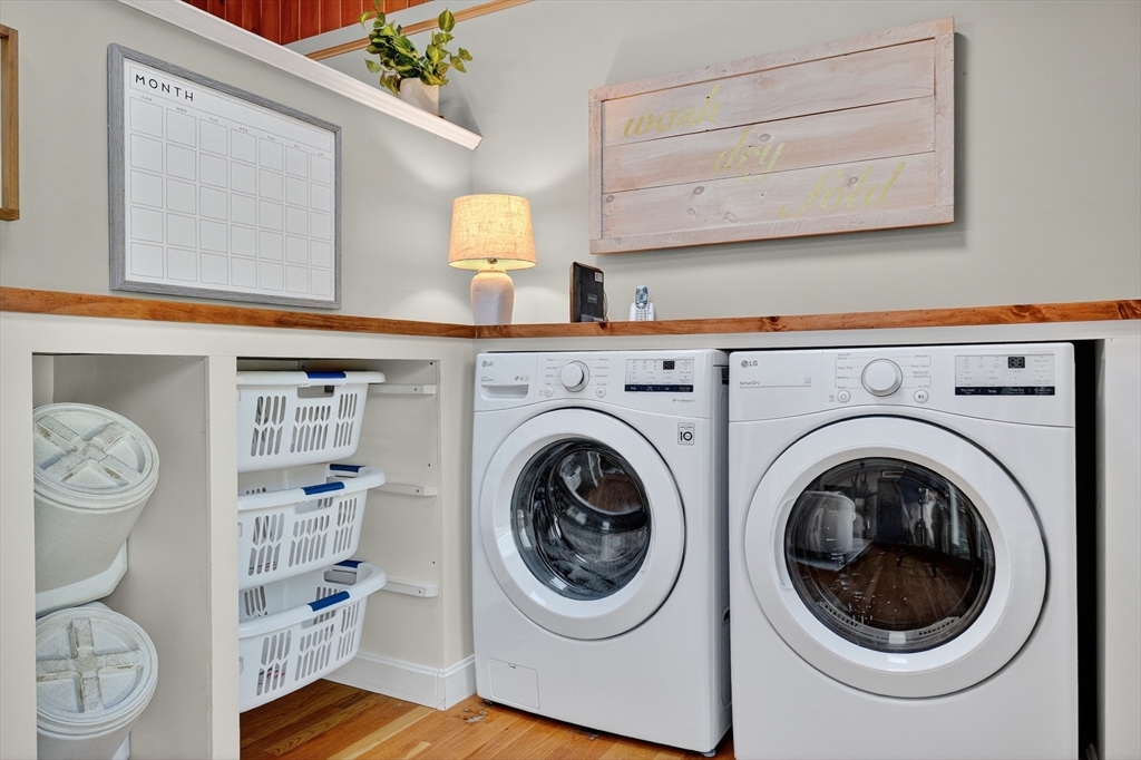 191 Hathaway Road Acushnet, MA 02743 - Photo 9 of 42 a utility room with sink dryer and washer