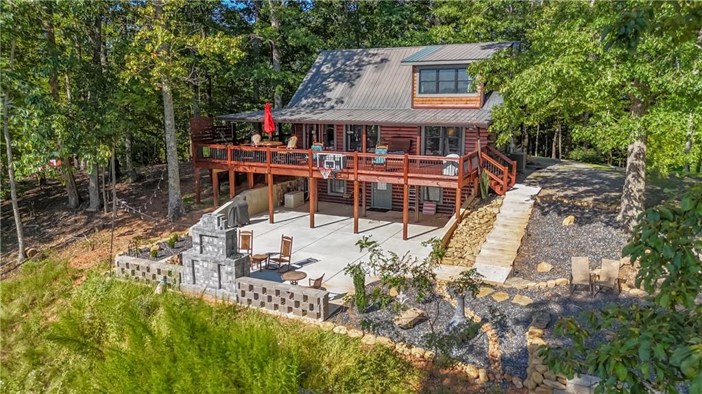 832 Scenic Mountain View Road Blue Ridge, GA 30513 - Photo 49 of 56 front view of house with a yard balcony