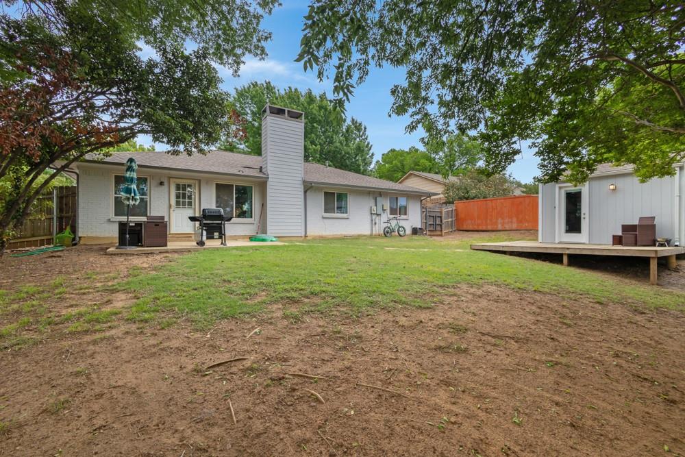 2522 Quail Ridge Drive Denton, TX 76209 - Photo 22 of 22 Patio, large yard and outbuilding with electrical and AC