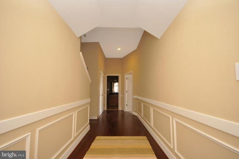 902 T Street Northwest, Unit A Washington, DC 20001 - Photo 7 of 19 Long hallway - perfect showcase for artwork!