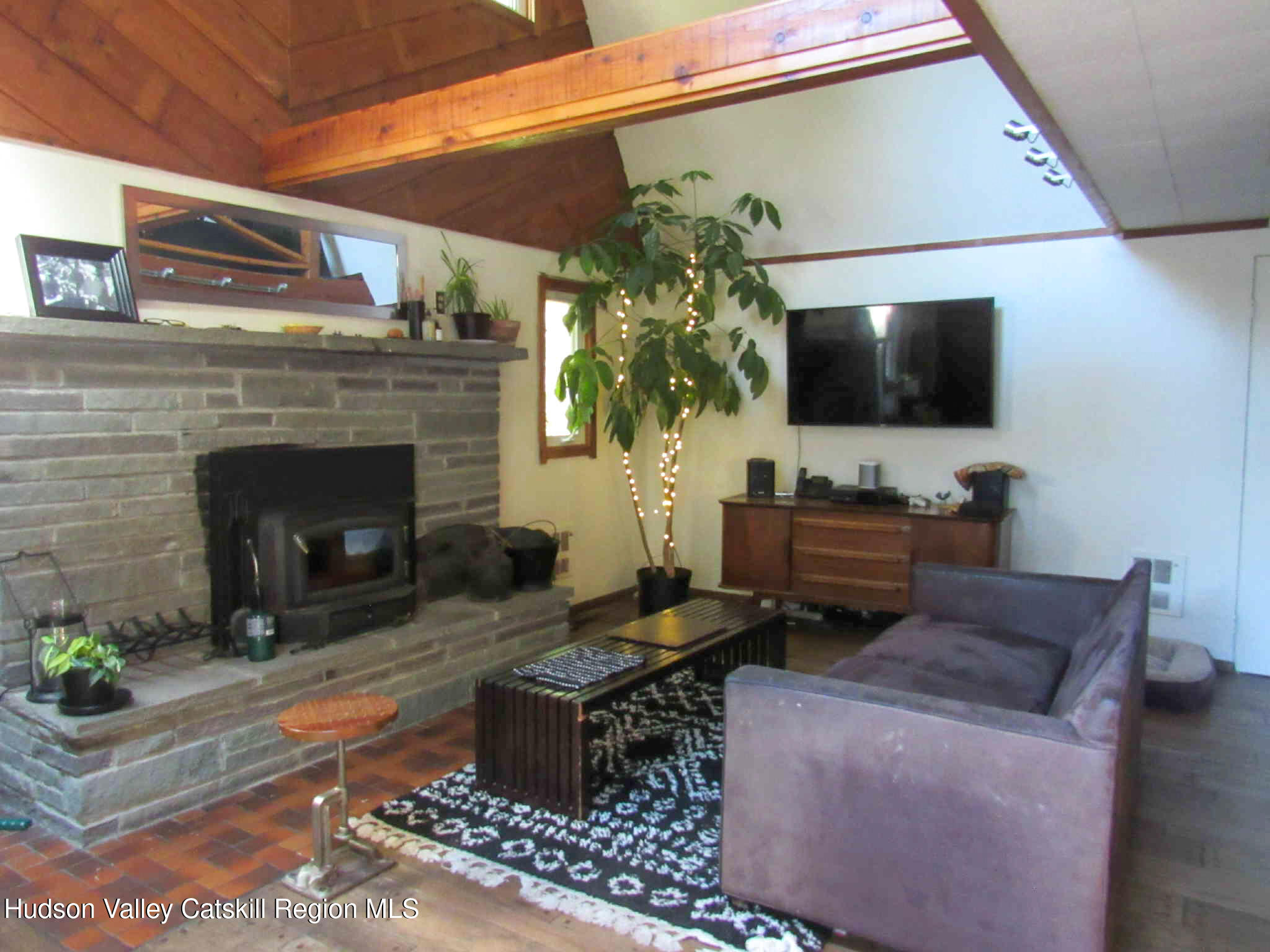 2 Crow Road Fleischmanns, NY 12430 - Photo 7 of 17 a living room with furniture and a flat screen tv