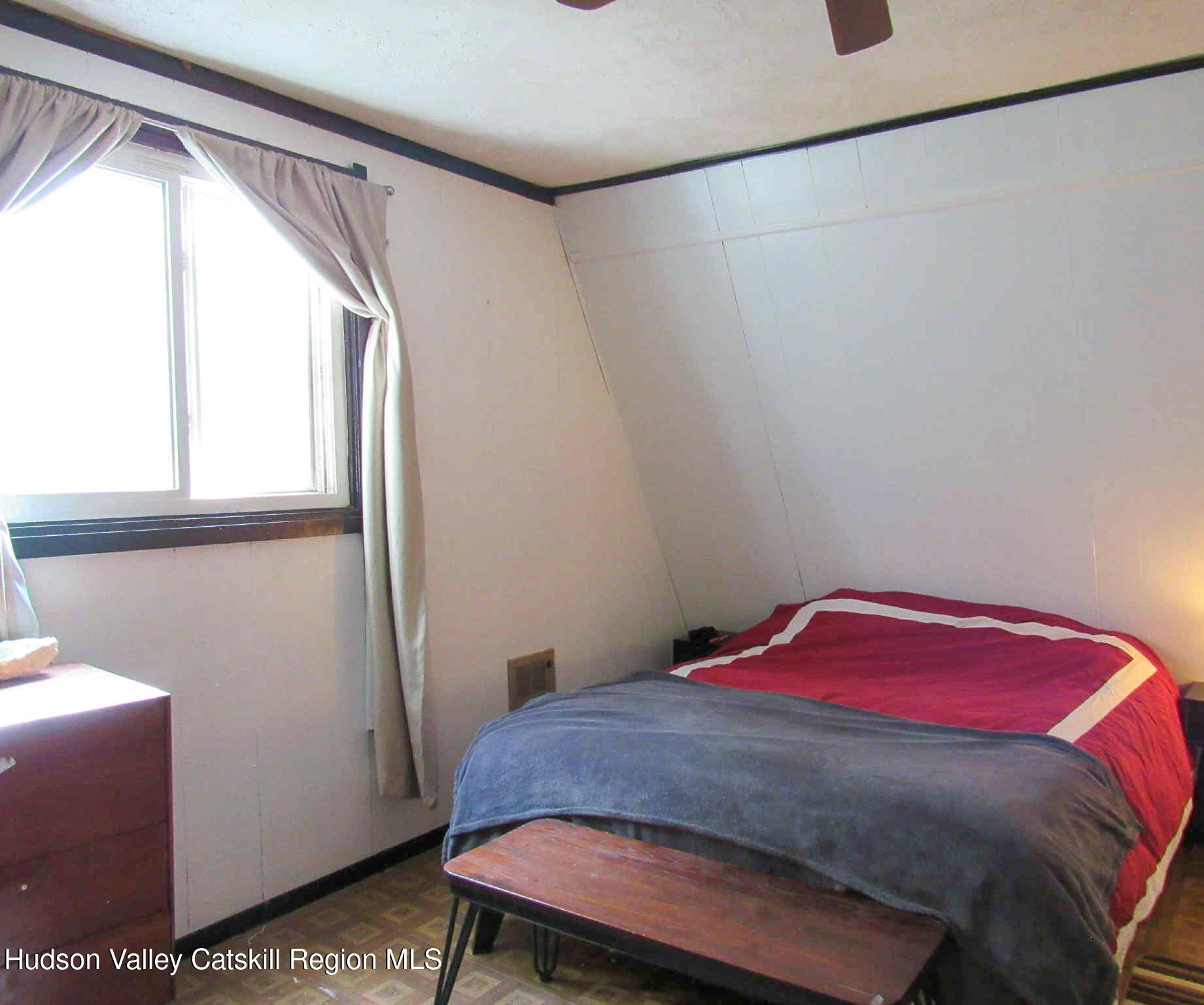 2 Crow Road Fleischmanns, NY 12430 - Photo 10 of 17 a bedroom with a bed and a window