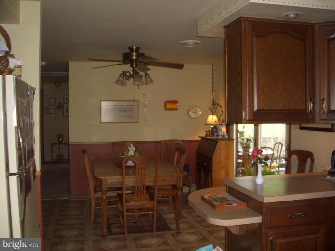 5658 Amos Reeder Road Boonsboro, MD 21713 - Photo 15 of 22 Dining area adjacent to kitchen and sunroom.