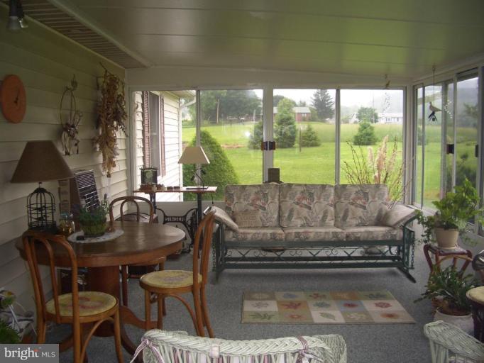 5658 Amos Reeder Road Boonsboro, MD 21713 - Photo 7 of 22 Relaxing and charming sunroom. (Heat and A.C.)