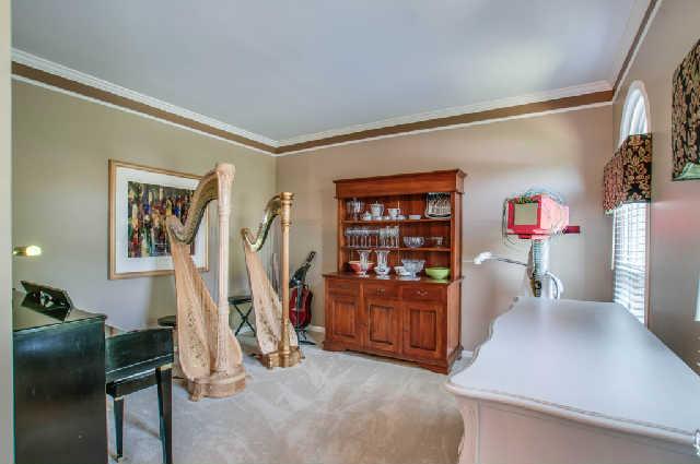 Formal living room, music room, or office with French doors for an added touch!