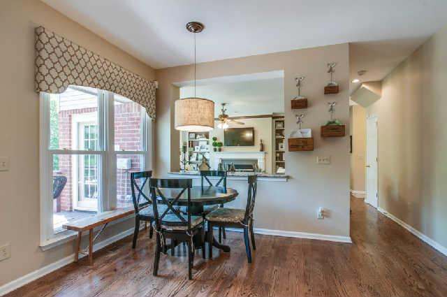 Delightful breakfast nook overlooks lush backyard!