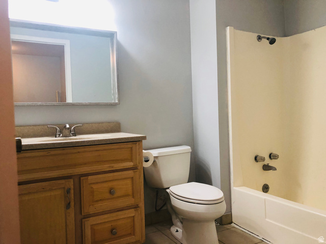 88 West 50 South, Unit B5 Centerville, UT 84014 - Photo 16 of 33 Full bathroom featuring vanity, shower / tub combination, and tile patterned floors