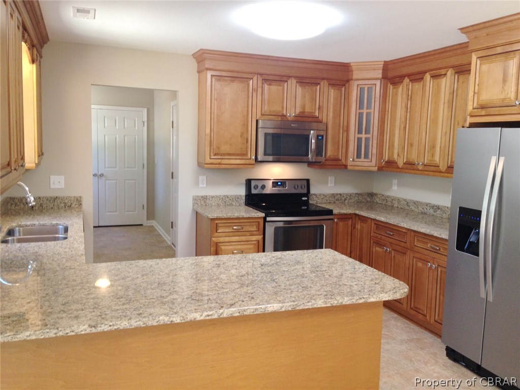 67 River Rd Circle Saluda, VA 23149 - Photo 8 of 13 Kitchen has custom cabinets.