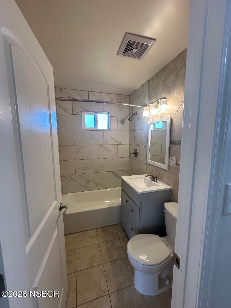 319 South B Street Lompoc, CA 93436 - Photo 15 of 19 a bathroom with a sink toilet and shower