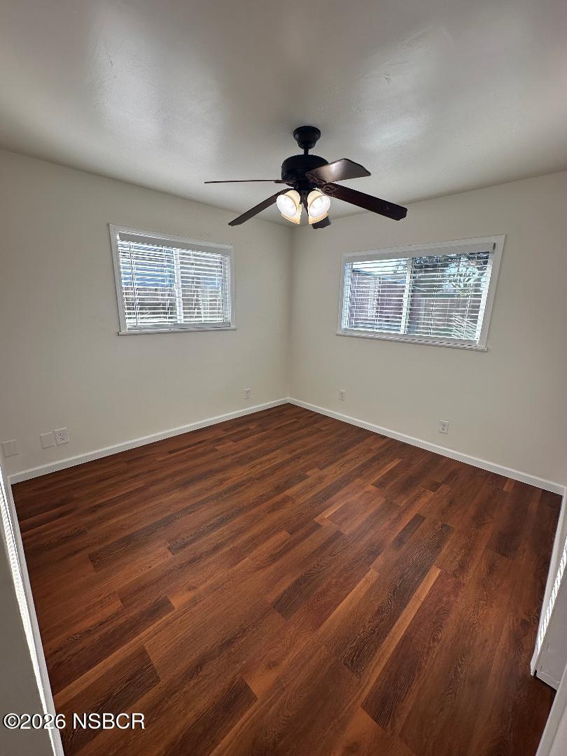 319 South B Street Lompoc, CA 93436 - Photo 19 of 19 a view of empty room with wooden floor