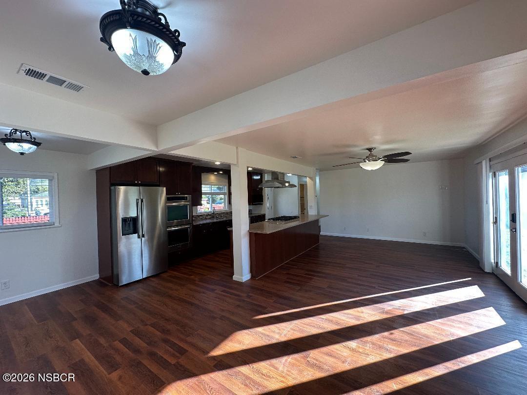 319 South B Street Lompoc, CA 93436 - Photo 9 of 19 a view of an empty room and window
