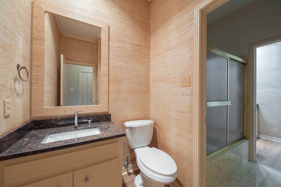 10907 Legends Lane Austin, TX 78747 - Photo 24 of 35 Bathroom featuring vanity and a shower with door