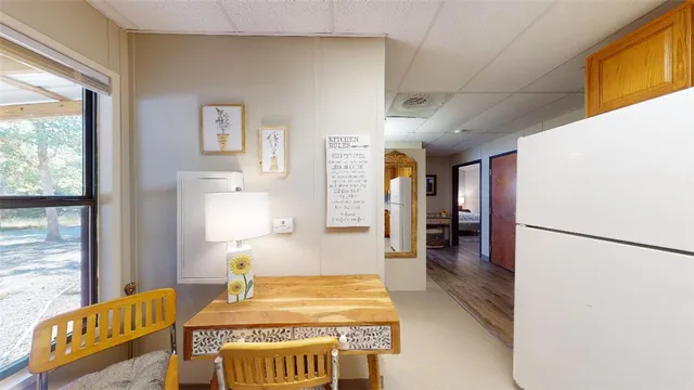 a bedroom with furniture and window