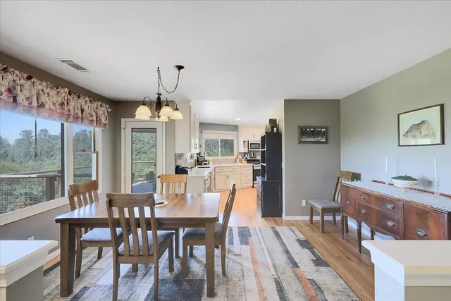 a kitchen with a sink stove and microwave