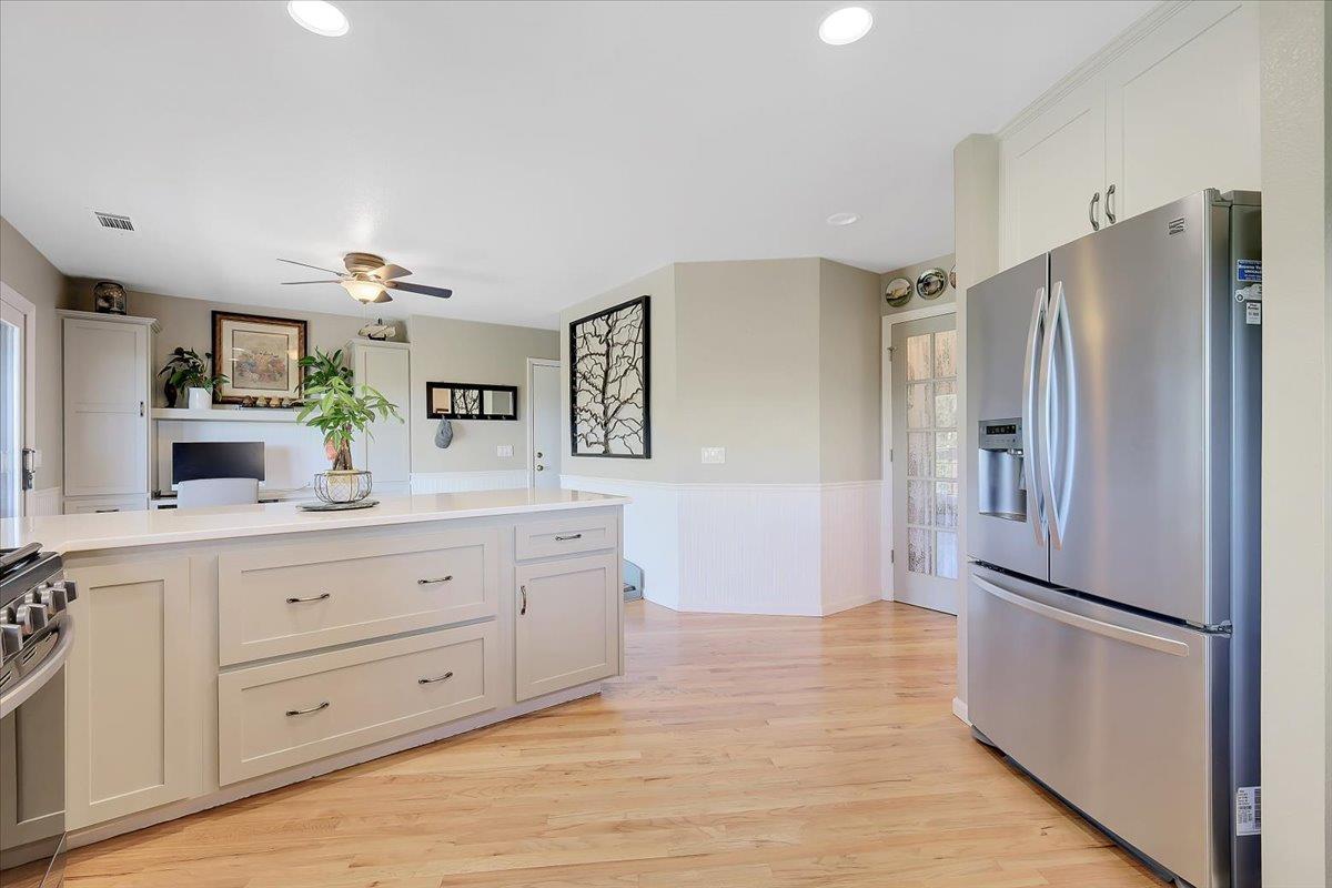 9521 Sicard Flat Road Browns Valley, CA 95918 - Photo 26 of 83 a kitchen with granite countertop stainless steel appliances a refrigerator and cabinets