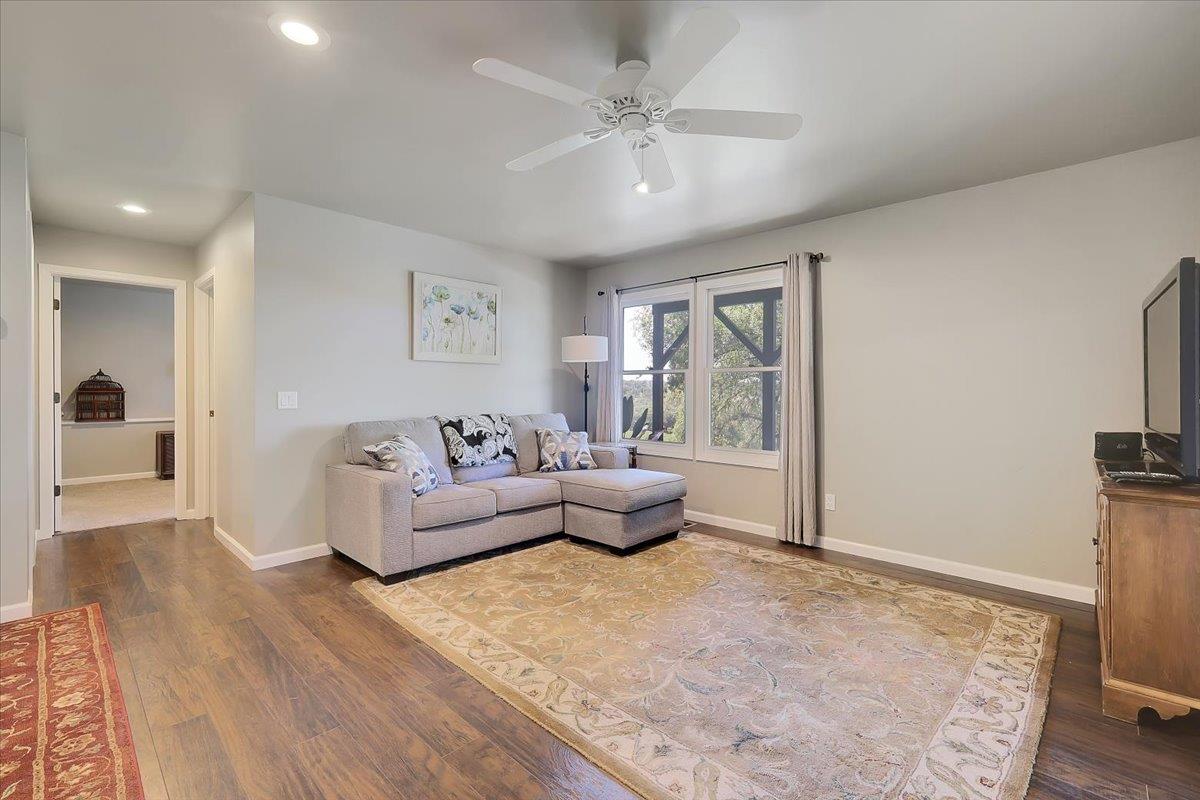 9521 Sicard Flat Road Browns Valley, CA 95918 - Photo 45 of 83 a living room with furniture and a chandelier