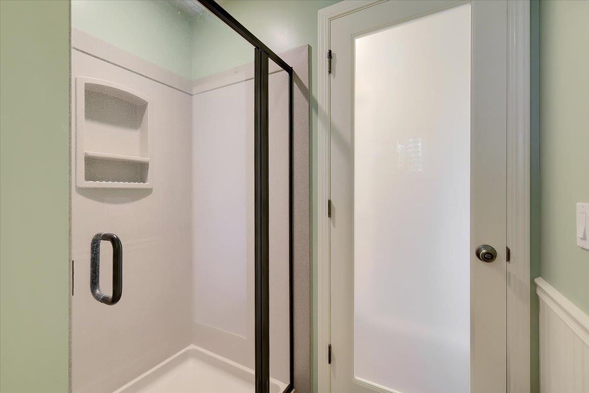 9521 Sicard Flat Road Browns Valley, CA 95918 - Photo 50 of 83 a bathroom with a shower and mirror