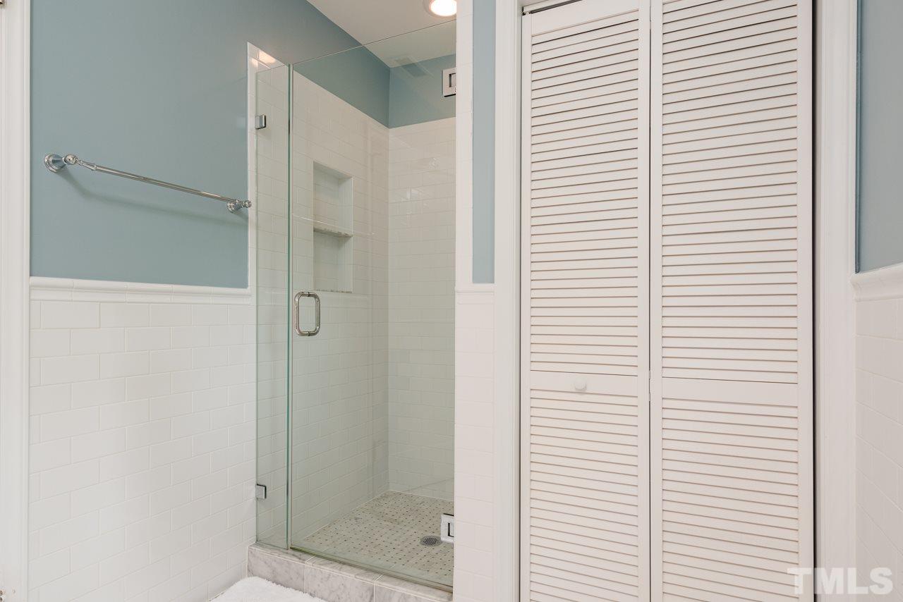 1205 Mitchell Street Raleigh, NC 27607 - Photo 5 of 25 a bathroom with a shower