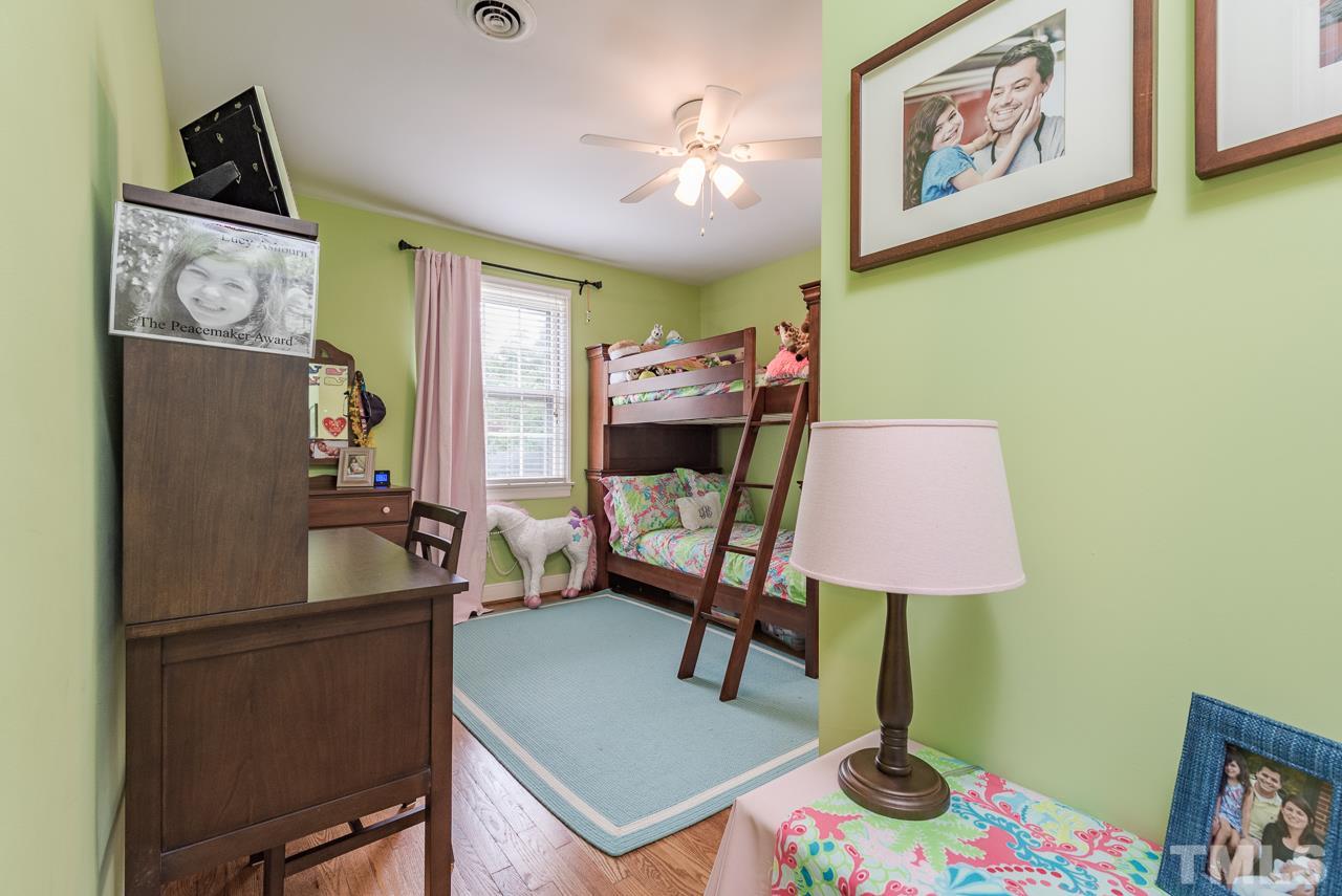 1205 Mitchell Street Raleigh, NC 27607 - Photo 10 of 25 a room with furniture and a table