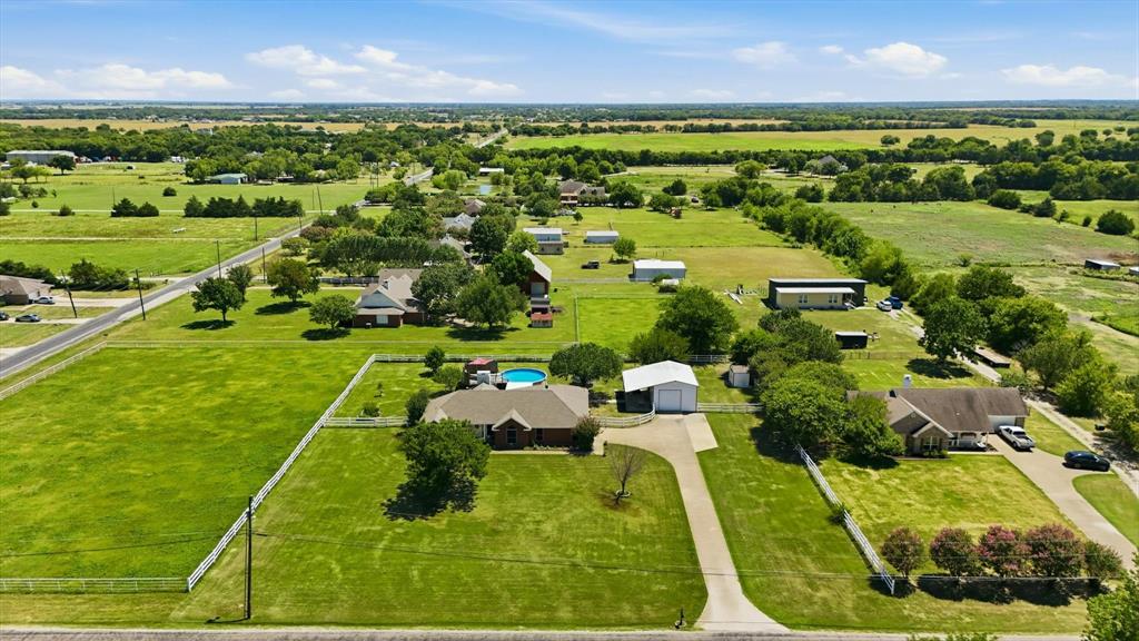 1328 Pierce Road Red Oak, TX 75154 - Photo 32 of 40 Expansive property featuring a single-story residence, a detached shop, and a fenced swimming pool