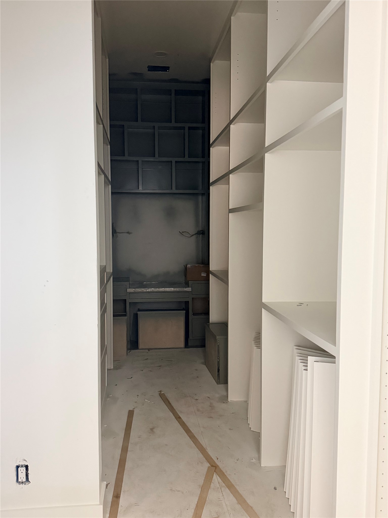 2518 Southline Road Conroe, TX 77384 - Photo 7 of 17 a utility room with a closet and racks