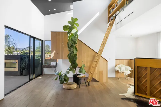 a view of a pathway with a garden