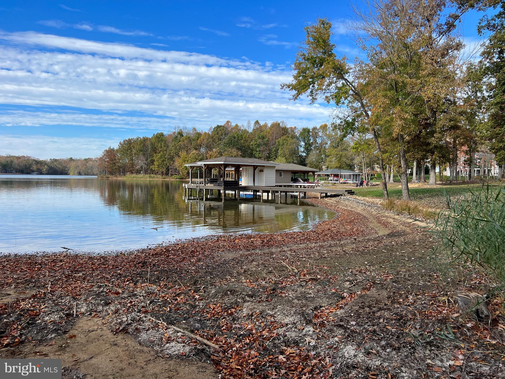 8 Rainbow Ridge Bumpass, VA 23024 - Photo 2 of 21 a view of a lake with a house