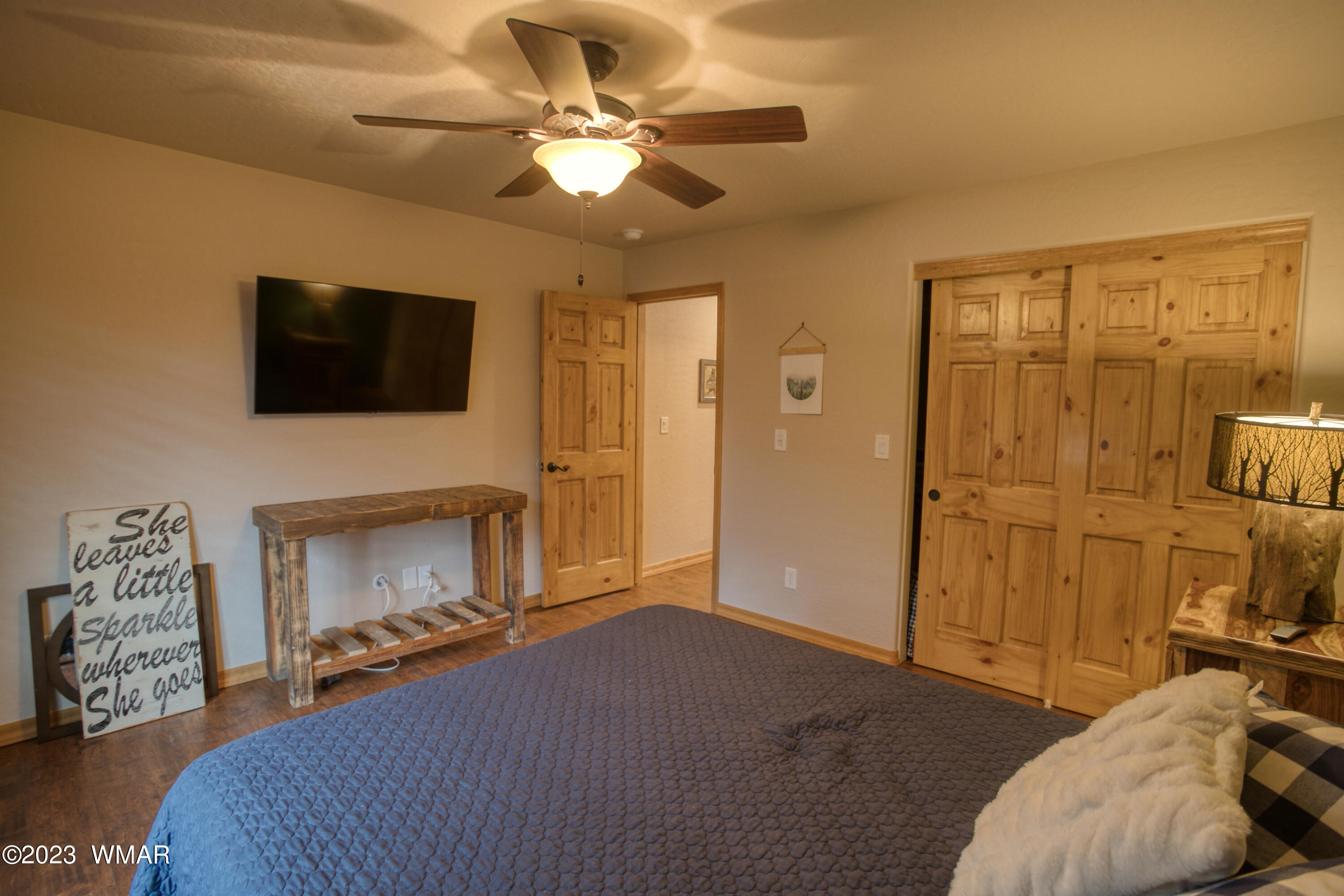 1979 Rim View Lane Heber, AZ 85928 - Photo 14 of 27 a living room with furniture a flat screen tv and a fireplace