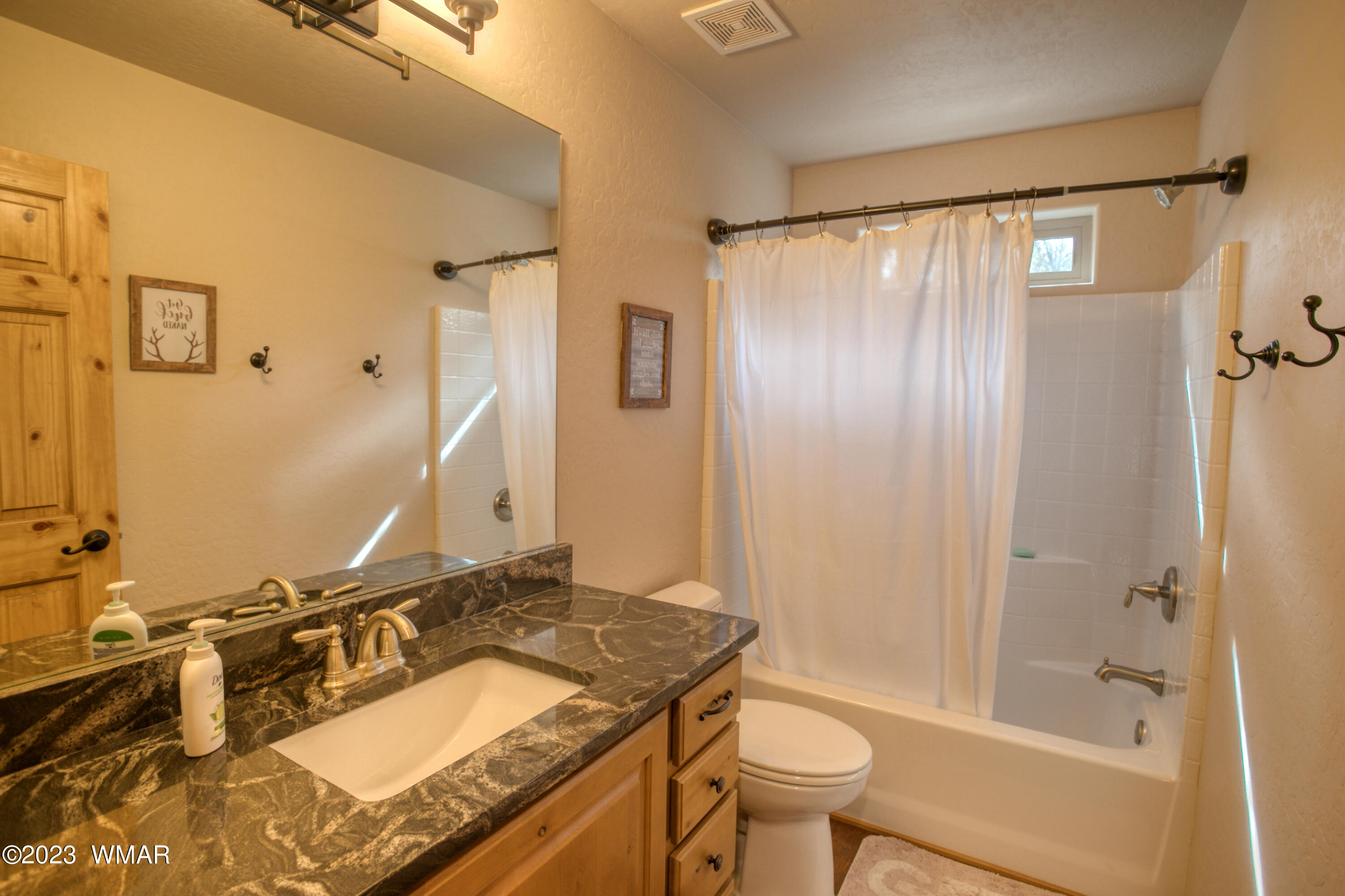 1979 Rim View Lane Heber, AZ 85928 - Photo 15 of 27 a bathroom with a sink and a mirror