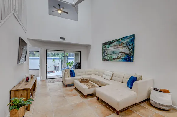a living room with furniture and a window
