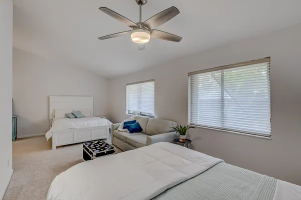 a bedroom with a bed and a cabinets