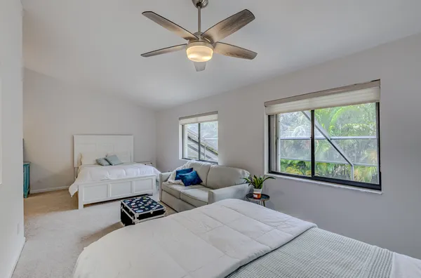 a hallway with a view of living room