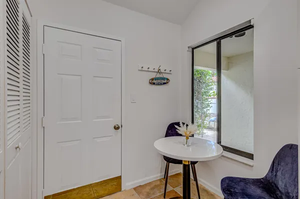 a kitchen with cabinets stainless steel appliances and a sink