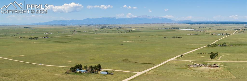 13642 Log Road Peyton, CO 80831 - Photo 25 of 29 a view of an ocean and a mountain