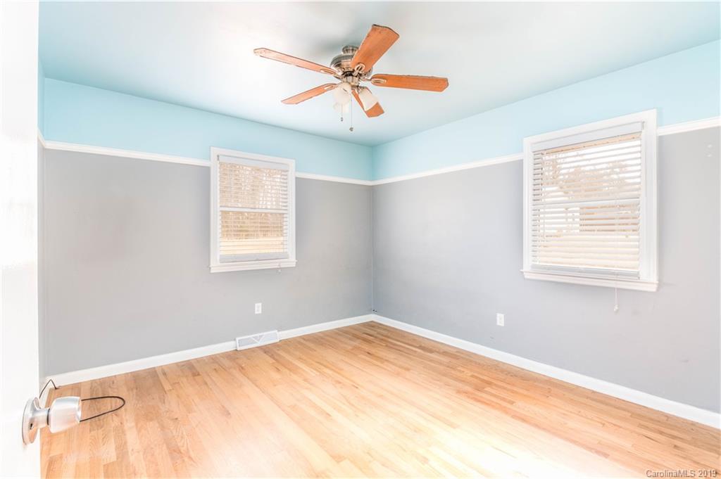 13800 Huntersville-Concord Road Huntersville, NC 28078 - Photo 13 of 16 a view of a room with window and ceiling fan