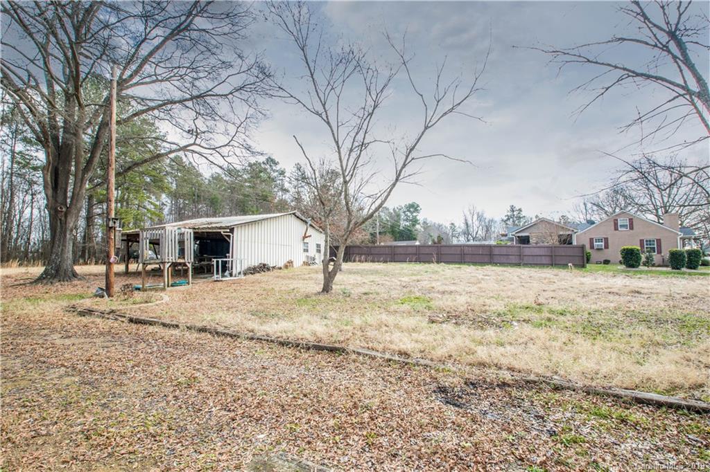 13800 Huntersville-Concord Road Huntersville, NC 28078 - Photo 15 of 16 a view of a yard with a tree